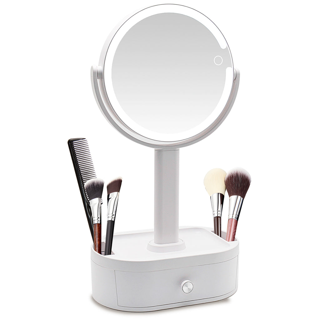 Espejo de maquillaje iluminado con aumento